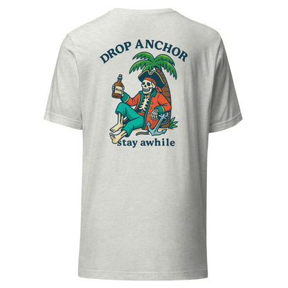 Idle Tides Co ‘Drop Anchor, Stay Awhile’ crewneck tee in ash with nautical text graphic across chest, relaxed fit, and dockside lifestyle design.