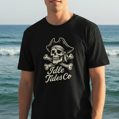Idle Tides Co Skull and Crossbones crewneck tee in black featuring embroidered pirate skull with tricorn hat above crossed bones; relaxed fit, nautical badge design.